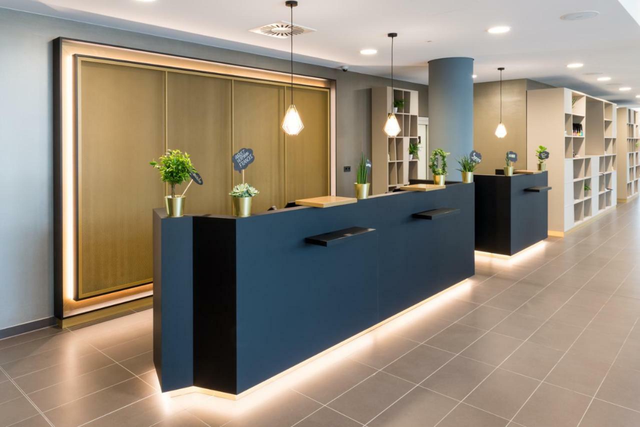 Holiday Inn - The Niu, Ridge Halle Central Station By Ihg מראה חיצוני תמונה
