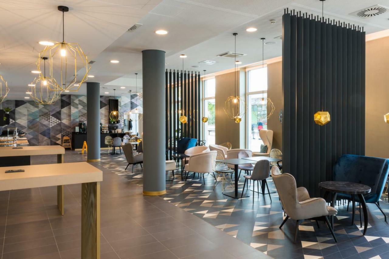 Holiday Inn - The Niu, Ridge Halle Central Station By Ihg מראה חיצוני תמונה